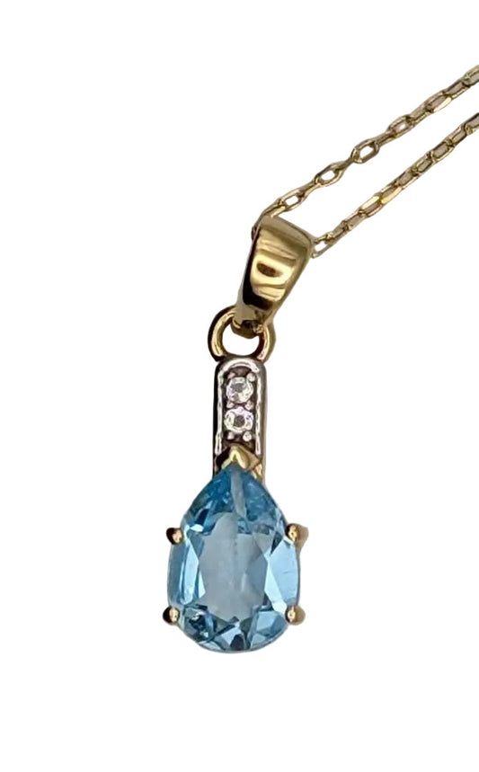 Eye Catching Blue Topaz Pendant on Gold Plated Sterling Chain