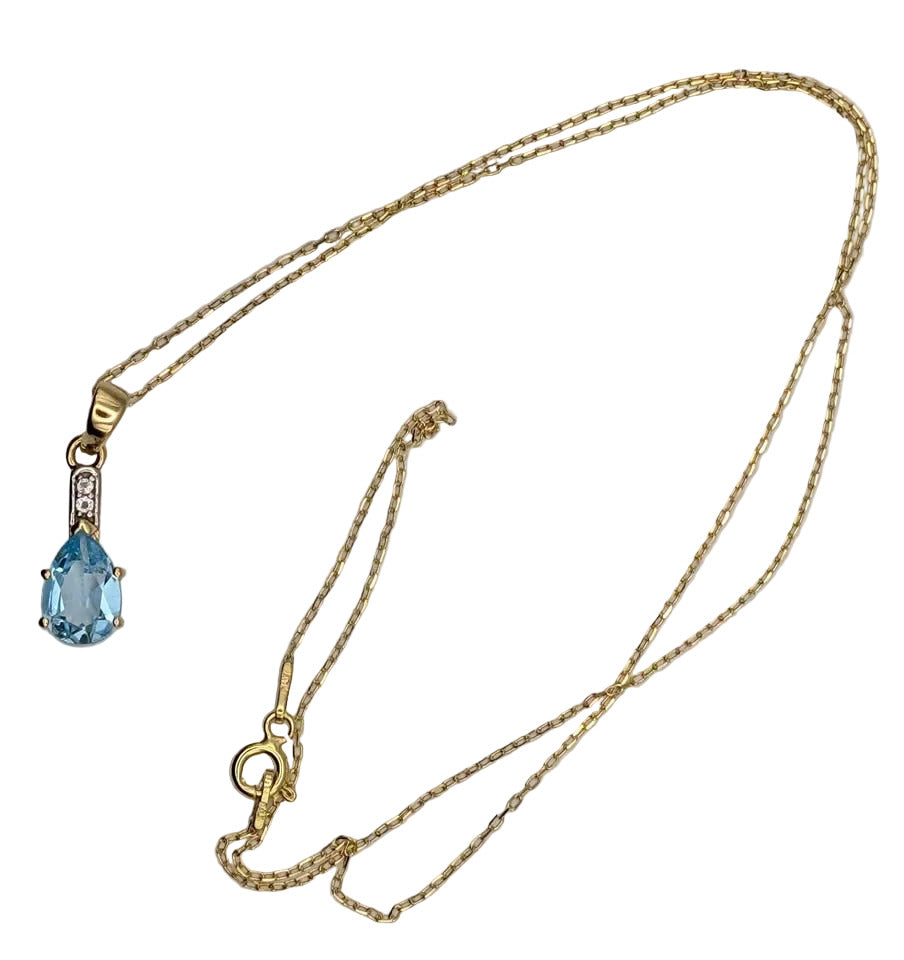 Eye Catching Blue Topaz Pendant on Gold Plated Sterling Chain